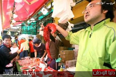 صور أكبر سوق سمك في العالم 120326150001jKmR